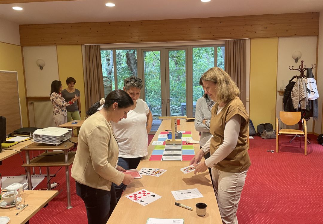 Research team at the card-game module of the Team Challenge at Hotel Springer Schlössl in Vienna